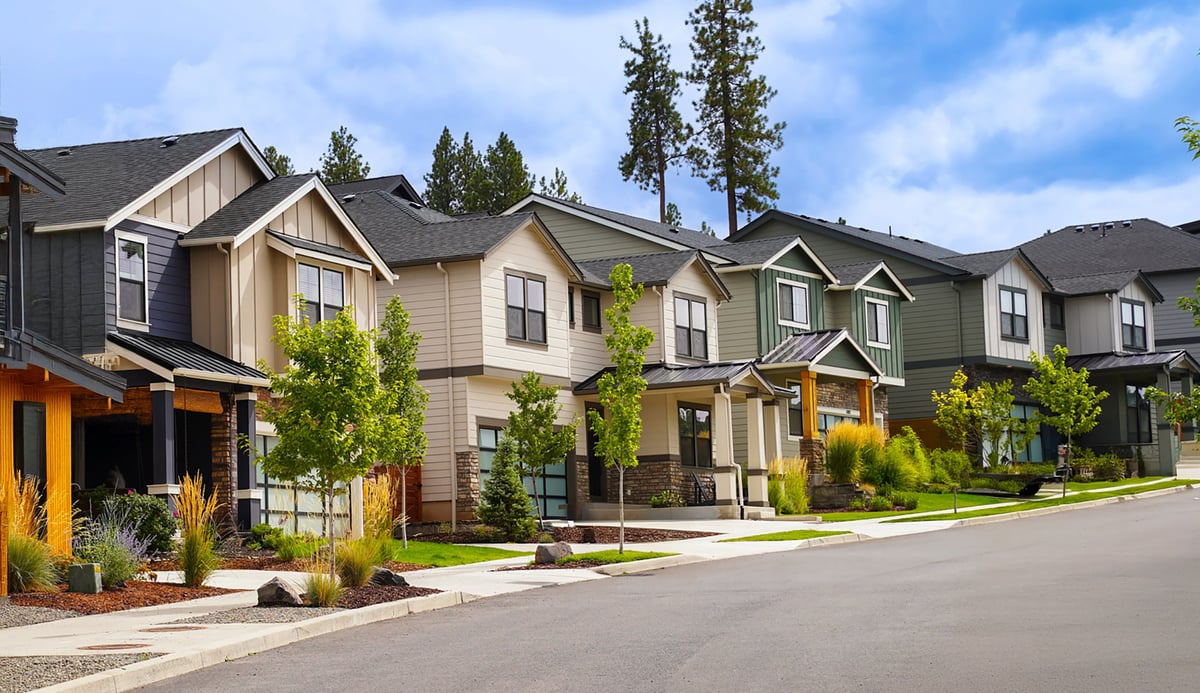 A quiet, high-end residential neighbourhood with blue sky