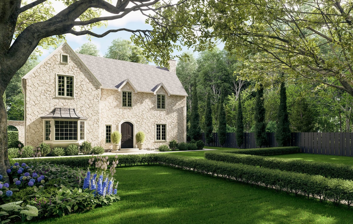 Luxury stone manor house with beautifully landscaped garden and lawn